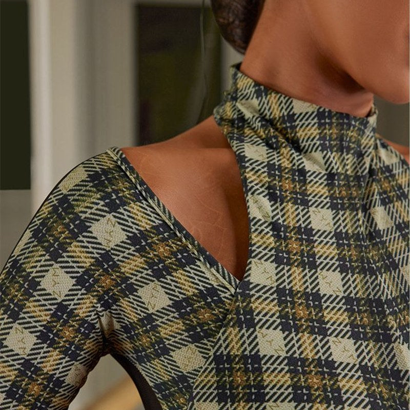 Plaid mock neck long sleeve crop top, close-up of the shoulder cutout