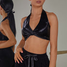 Black twist front halter top, front close-up