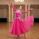 Rose Red ballroom dress worn by a dancer in a ballroom, full length front view