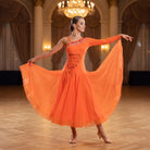 Orange ballroom dance dress with a beaded asymmetric bodice and full chiffon skirt