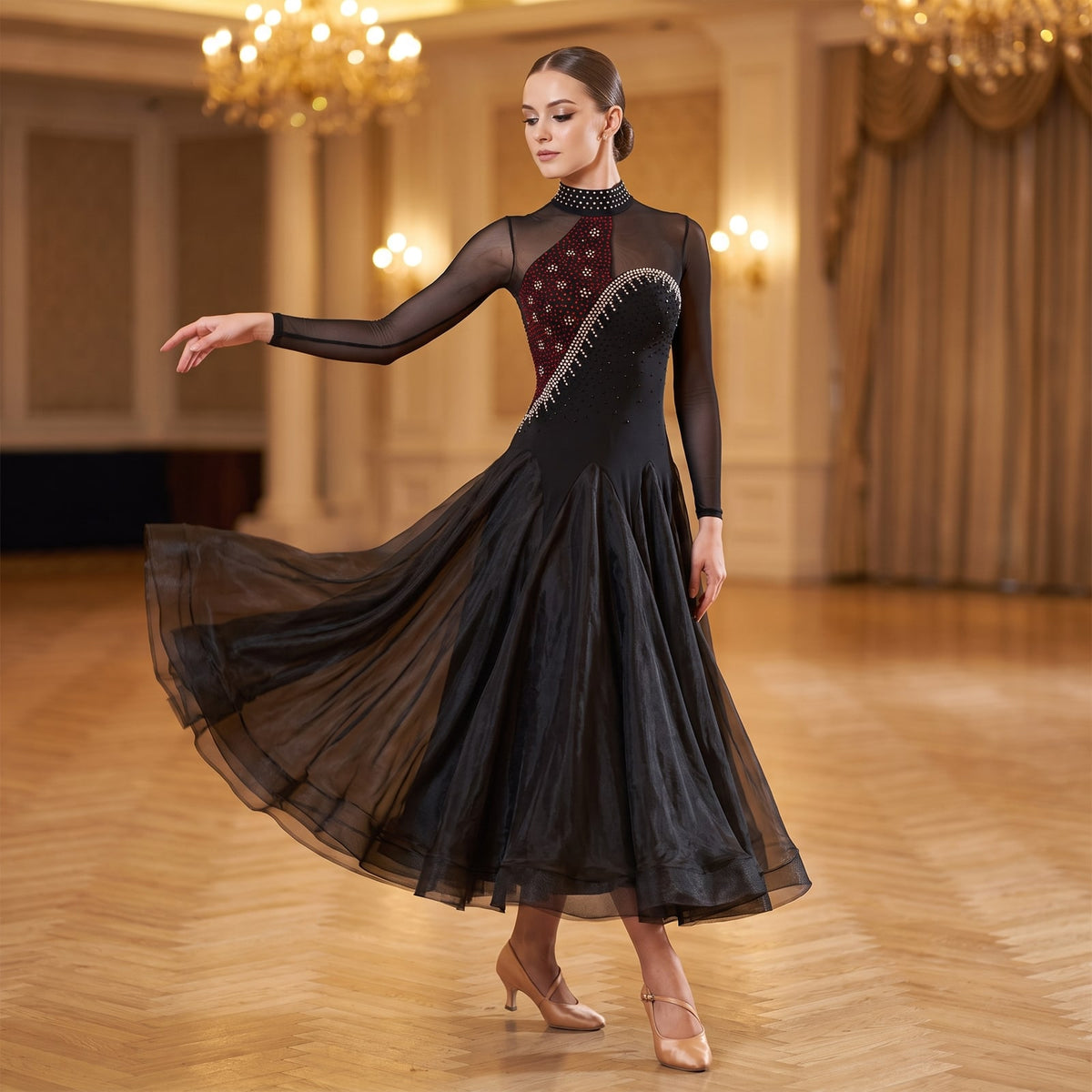 Black ballroom dance dress with a rhinestone swirl across the bodice and contrast godet skirt