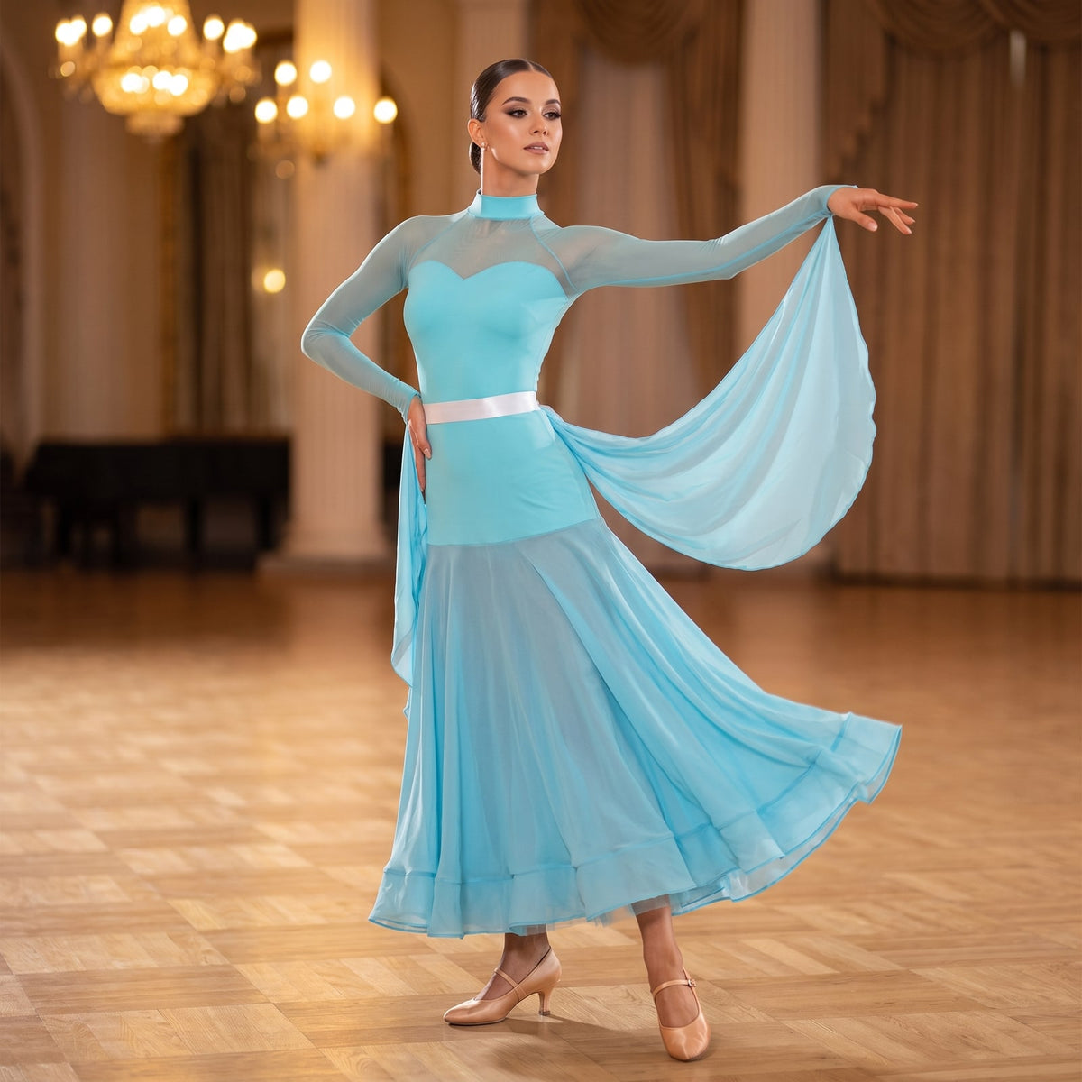 Light blue ballroom dress with a long floating chiffon panel sweeping out from the shoulder
