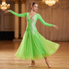 Neon green ballroom dance dress with pearl lace applique down the bodice and organza skirt