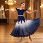 Navy ombre ballroom dress with a ruffled sweetheart neckline turning on a ballroom floor