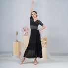 Side ruffle cascade and wrap panel of the black ballroom dance skirt