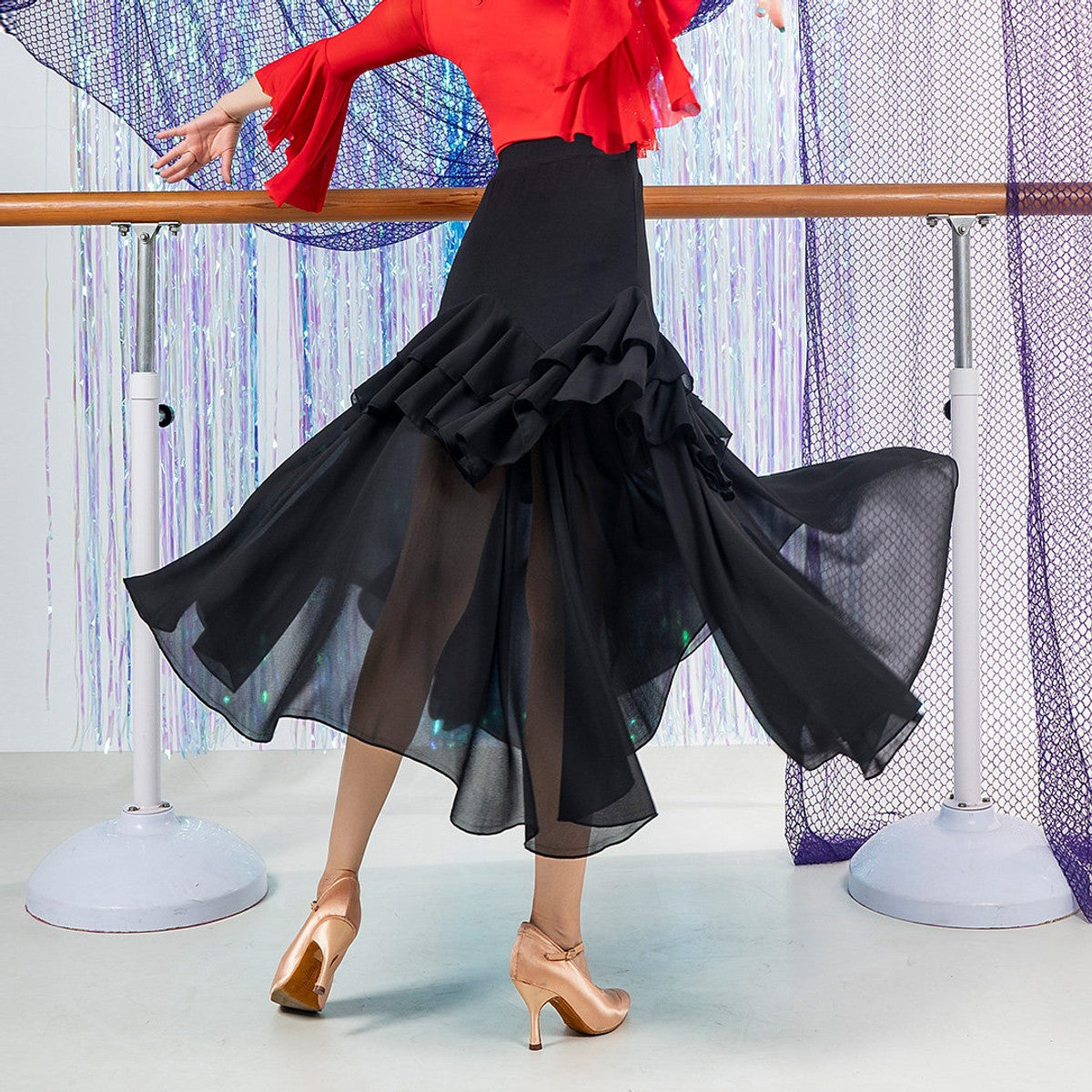 Black ballroom dance skirt, back view with sheer chiffon swing hem flared out