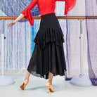 Black ballroom dance skirt with ruffle tiers and chiffon hem, back view