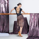 Black lace trim lace up back dance bodysuit, back view