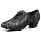 black lace-up ballroom practice shoe for women, three-quarter view of floral lace overlay and cuban heel