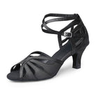black satin latin dance shoe for women with a fanned cutout vamp, crossed ankle straps, peep toe and a flared heel