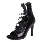 black patent open-toe dance boot for women with wraparound lace ties and cutout side panels