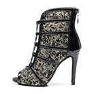 black patent dance boot for women with gold leaf embroidery on sheer mesh and thin stiletto heel
