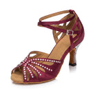 Burgundy satin latin dance shoes side view, open toe salsa heels with a rhinestone fan vamp, crossed ankle straps and a crystal covered flared heel