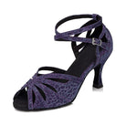 dark purple sparkle latin dance shoe for women with a fanned cutout vamp, crossed ankle straps and a flared heel