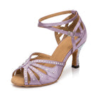 Lilac satin Latin dance shoes side view, rhinestone open toe strappy sandal with pave flared heel and suede sole