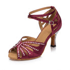 Burgundy satin latin dance shoes side view, open toe salsa heels with a rhinestone fan vamp, crossed ankle straps and a crystal covered flared heel