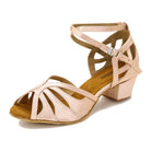 nude latin dance shoe for women with a fanned cutout vamp, crossed cutout ankle straps and a low block cuban heel