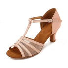 nude satin latin dance shoe for women with a T-strap vamp, mesh inserts across the toe and a low flared heel