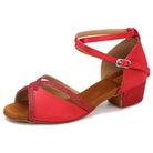 red satin latin dance shoe for women with red glitter trimmed crossover straps, crossed ankle strap and a low glitter block heel