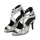 pair of snakeskin print latin dance shoes for women with crossed cutout side straps, buckled ankle strap and stiletto heel