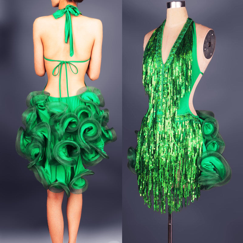 Green sequin fringe latin dance dress seen from the back showing the halter tie and open back with the rosette skirt