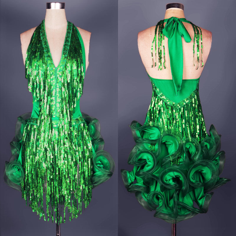 Green sequin fringe latin dance dress front view with deep V neckline and curled organza rosette hem