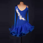 Blue latin dance dress showing the rhinestones set between the white flower appliques