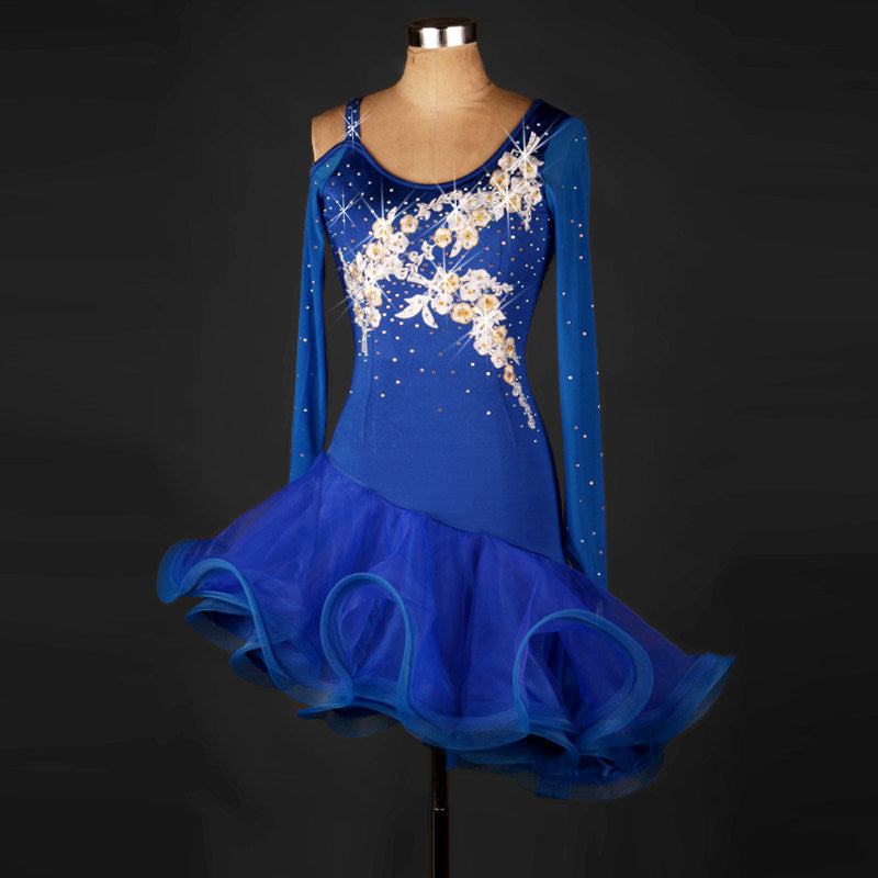 Blue latin dance dress rear view with cold shoulder sleeves and organza ruffle hem