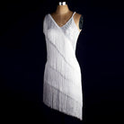 White tiered fringe latin dance dress with stoned V neckline and diagonal tassel rows