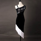 Black latin dance dress with white fringe hem shown from the front