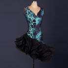 Teal animal print latin dance dress side view with the black ruffle skirt