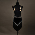Black velvet latin dance dress rear view showing the thin straps and open back