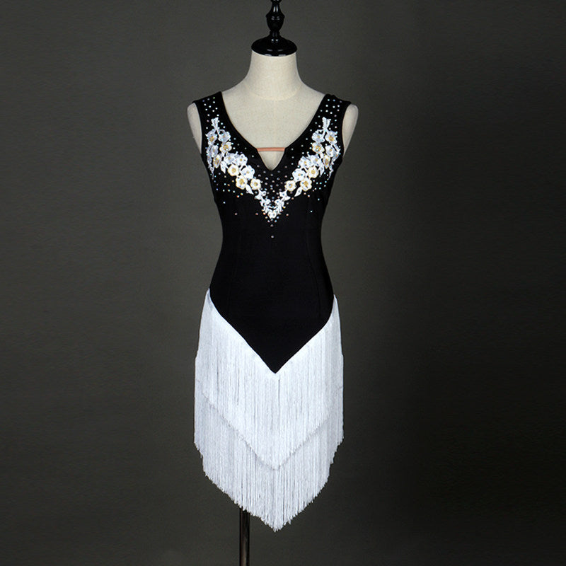 Black latin dance dress with white floral appliques and white tassel fringe skirt