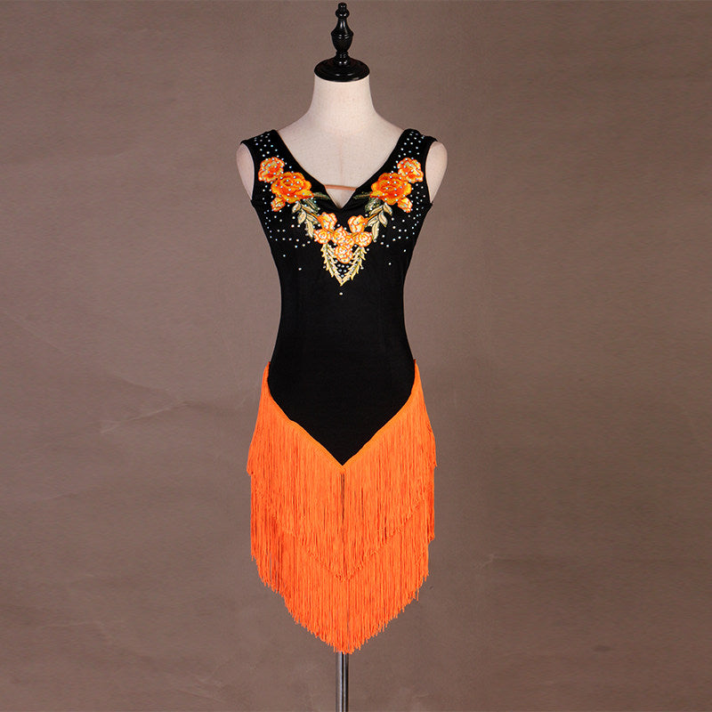 Black latin dance dress with orange appliques and orange tassel fringe skirt