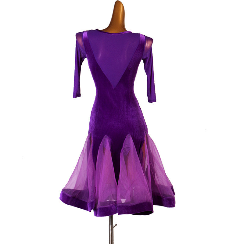 Purple latin dance dress side view showing the flared skirt in movement