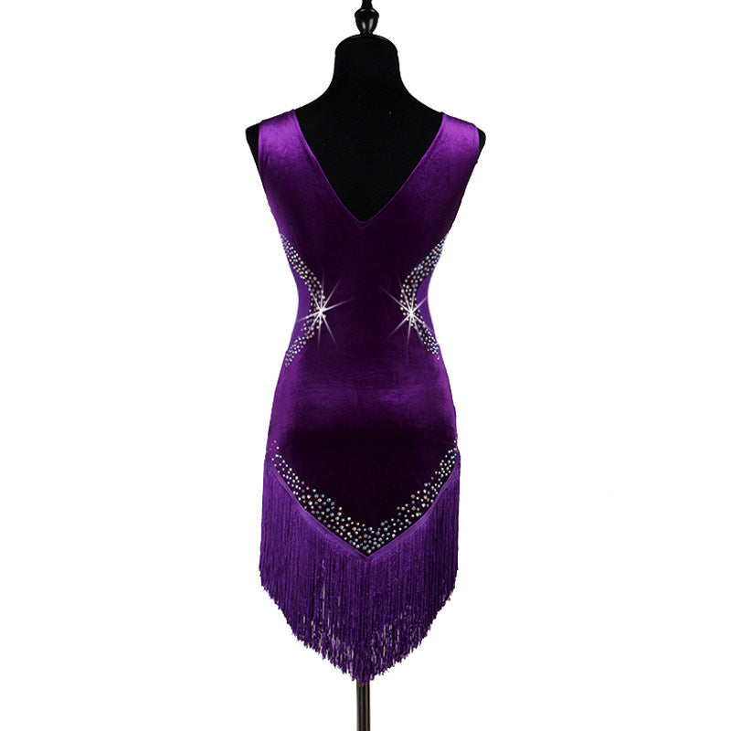 Purple latin dance dress rear view showing the open back and fringe hem