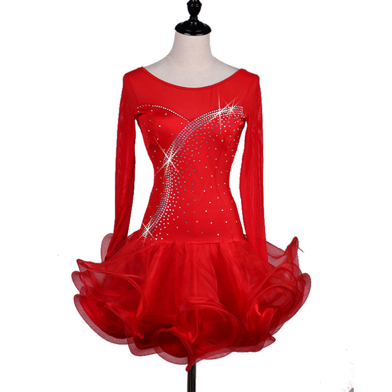 Red long sleeve latin dance dress showing the sheer mesh chest panel and stonework