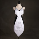 White dense fringe latin dance dress with black beaded trim at the neckline