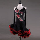 Black latin dance dress side view showing the red and black ruffle hem