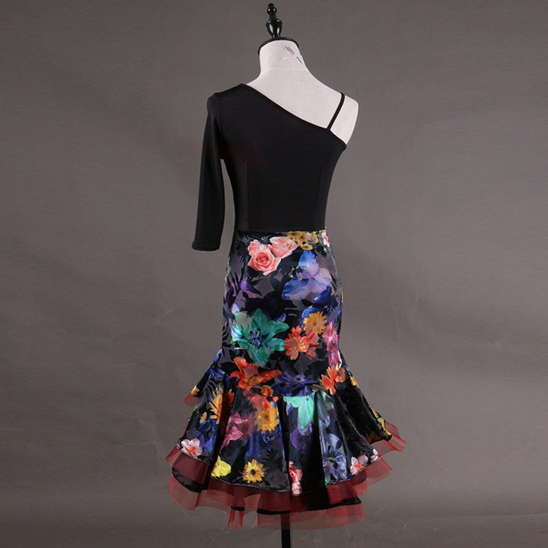 Latin dance dress with floral print skirt seen from the back with the red trimmed hem