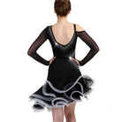 Model showing the back of the black rhinestone latin dance dress with mesh sleeves