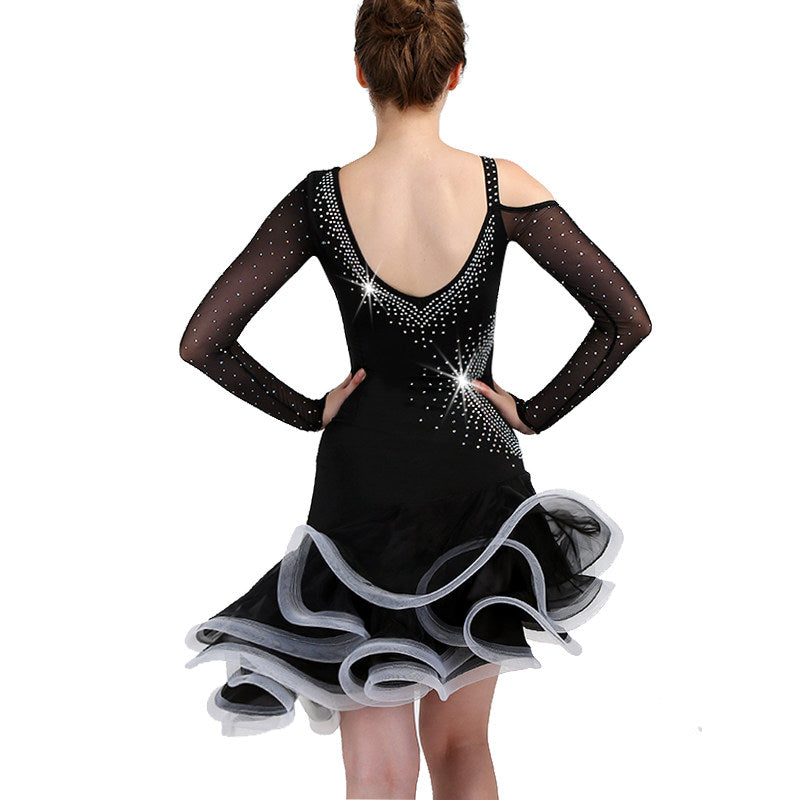 Model showing the back of the black rhinestone latin dance dress with mesh sleeves