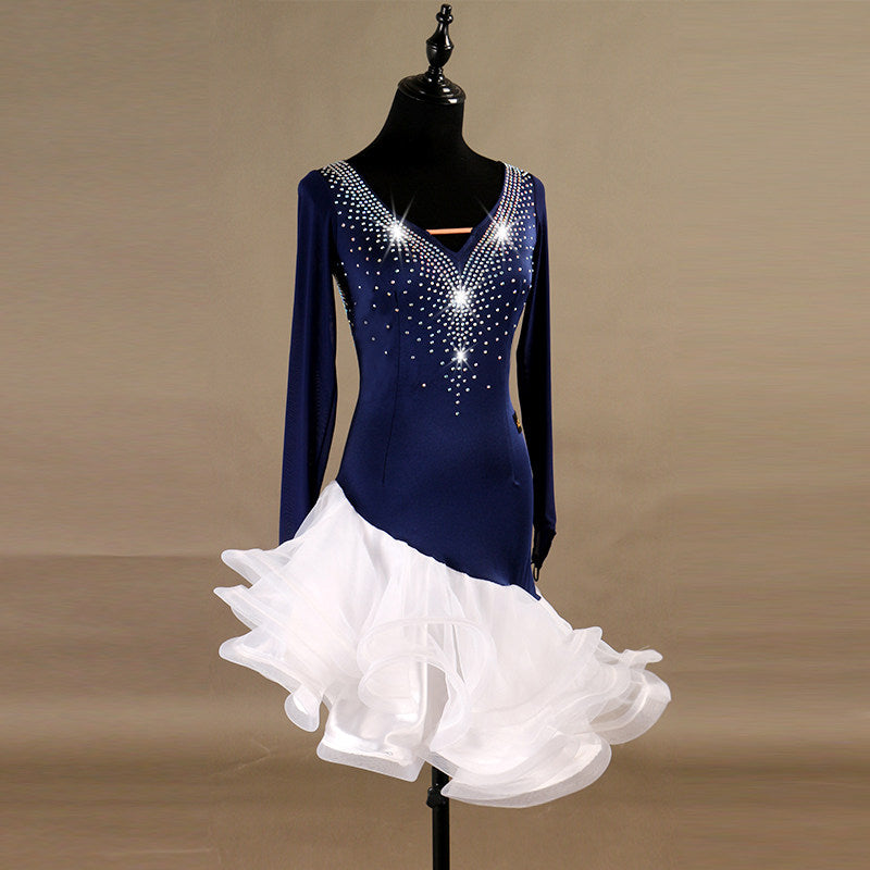 Navy latin dance dress front view showing the long sleeves and crystal shoulders