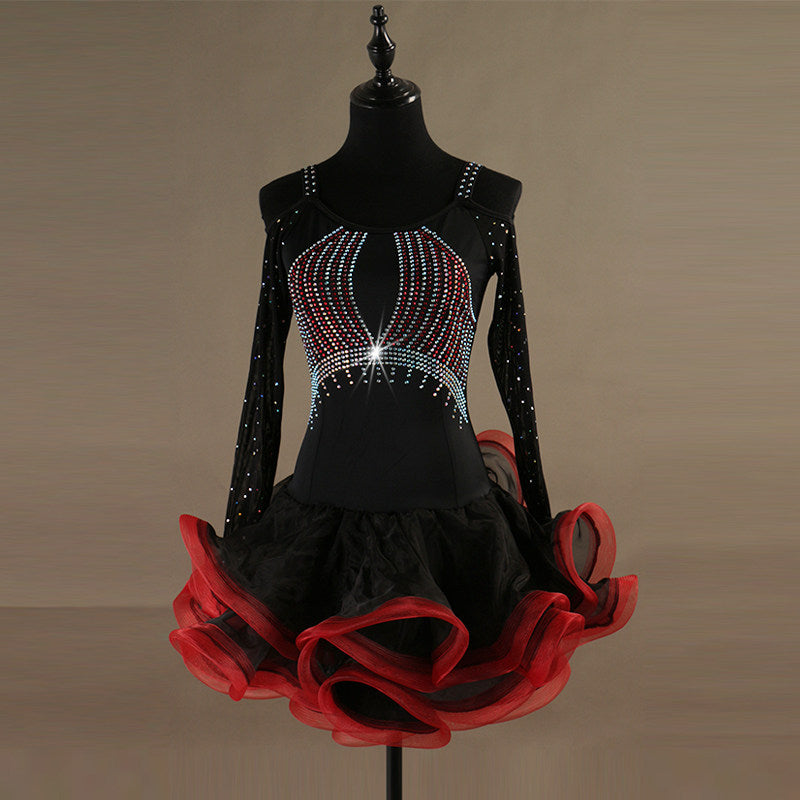 Black latin dance dress angled view with the red and black ruffle layers