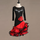 Black latin dance dress with crystal sweetheart bodice, red rose corsage and red ruffle skirt