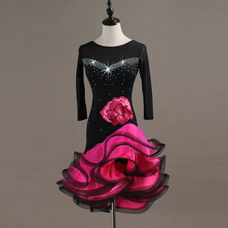 Black latin dance dress angled view showing the mesh yoke and crystal line