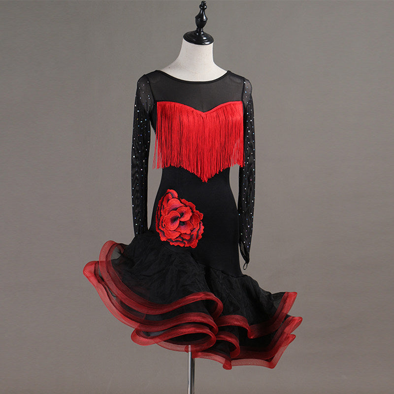 Black latin dance dress angled view with the red fringe moving