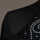 Close view of the stoned collar band and crystal scroll