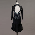 Black latin dance dress rear view showing the bare oval opening below the blue stoned collar