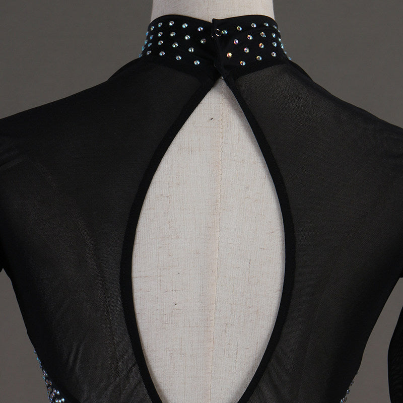 Close view of the stoned high collar and open back opening